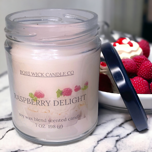 Indulge in the luscious scent of Raspberry Delight with this single wick, soy wax blend scented candle. Bursting with bright citrus, vanilla, and juicy raspberry, it's perfectly balanced with hints of fresh berries and a creamy buttery blissful dessert . Let this thoughtfully crafted accord transport you to a fruit-filled fantasy.