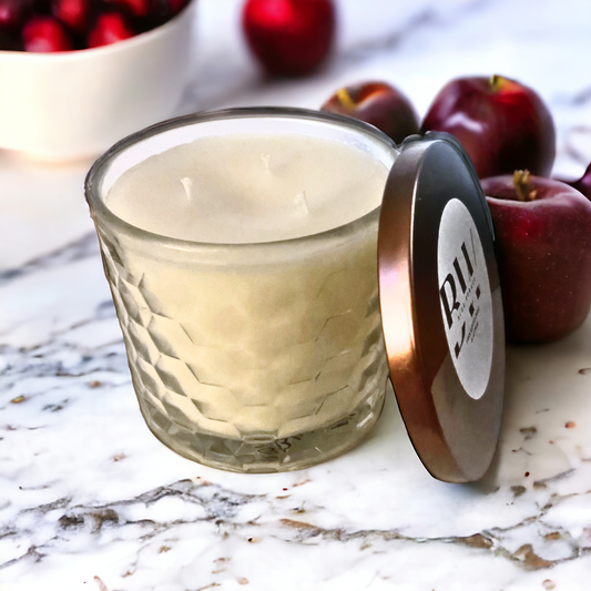 Indulge in the warm and inviting fragrance of our Cranberry Apple 3 wick scented candle. The perfect addition to your cozy evening ritual, this candle creates a cozy ambiance while filling your home with the delicious scent of cranberries and crisp juicy red apples. Made with 3 wicks for even burning and long lasting enjoyment.